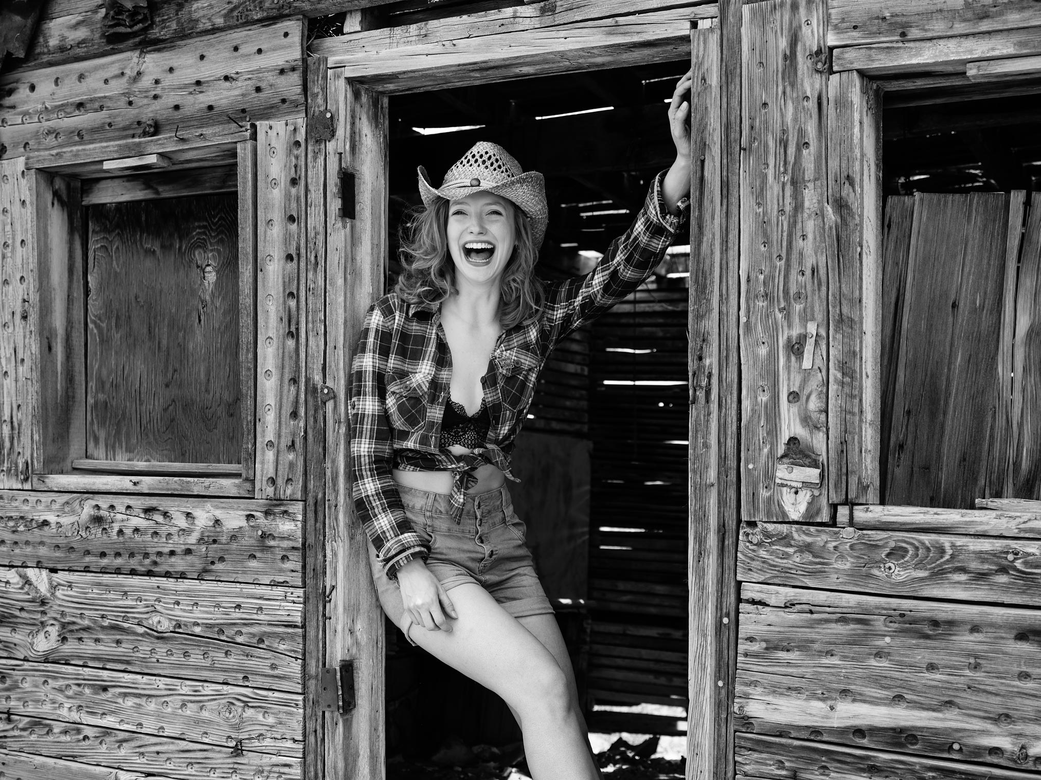 Claire Rammelkamp in a shack in the Wild West USA
